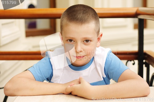 Image of Boy sitting at table