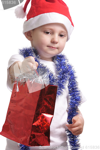 Image of Little Santa with gifts