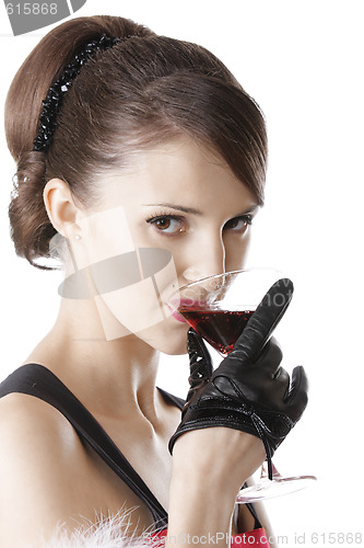 Image of Woman drinking cocktail