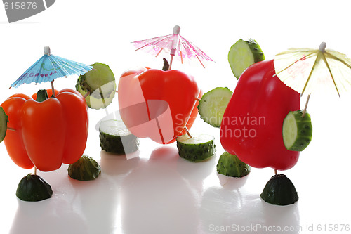 Image of Three paprika with reflections