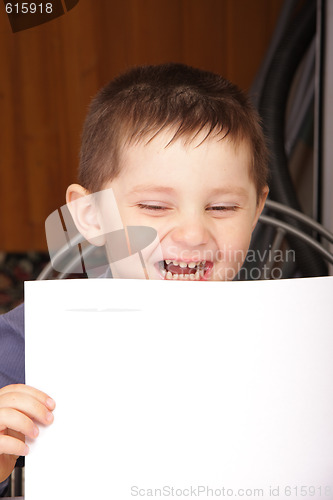 Image of Laughing boy with white sheet
