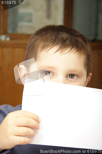 Image of Boy with white paper
