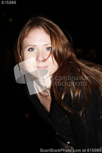 Image of Posing red-haired girl