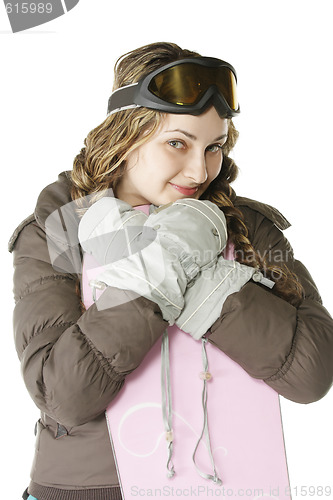 Image of Girl leaning on snowboard