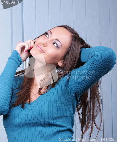 Image of Brunette with mobile