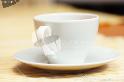 Image of White cup and saucer