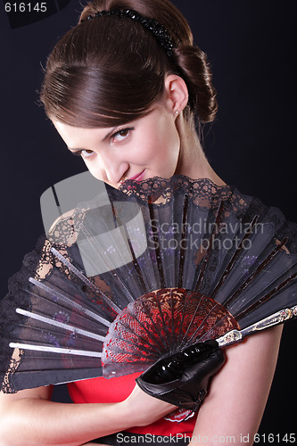 Image of Woman with fan