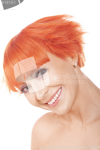 Image of Smiling widely redhead