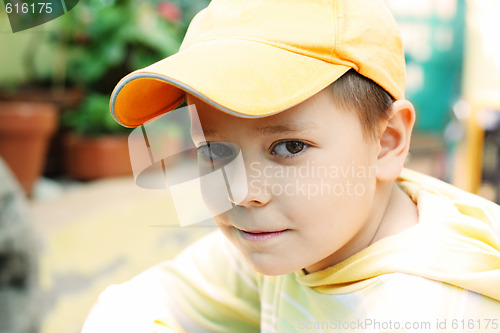 Image of Boy in yellow cap