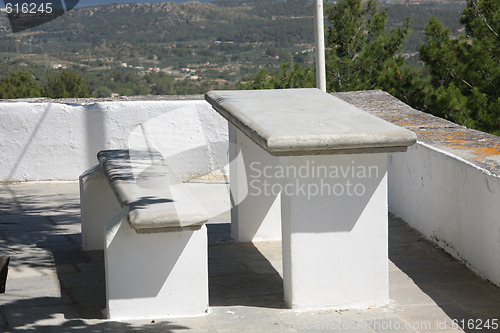 Image of Stone bench and table