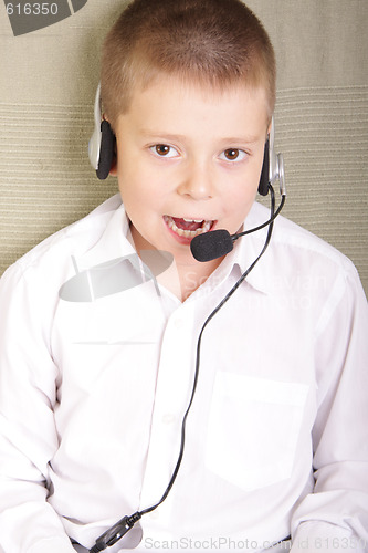 Image of Boy talking to headset microphone