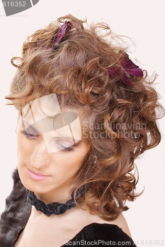 Image of Young woman curly hairstyle