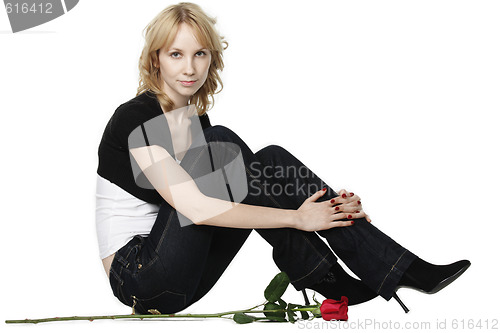 Image of Sitting girl and red rose