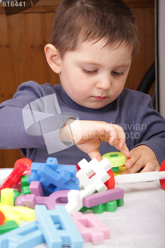 Image of Assembling toy blocks