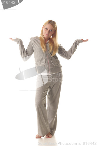 Image of Blonde standing hands apart