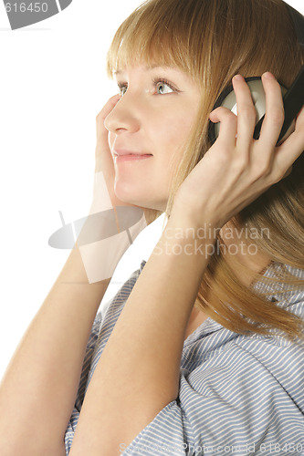 Image of Girl in headphones looking to side