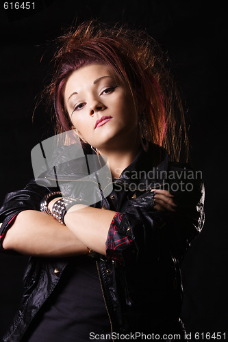 Image of Confident woman in black jacket