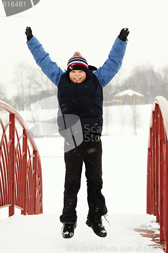 Image of Jump on snow-covered bridge