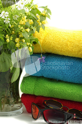 Image of Flowers and towels