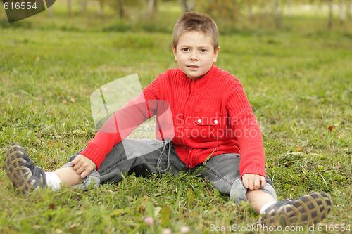 Image of Sitting on grass