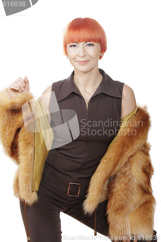 Image of Posing in brown fur coat