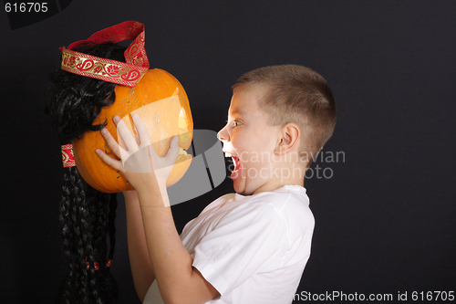 Image of Boy and halloween pumpkin