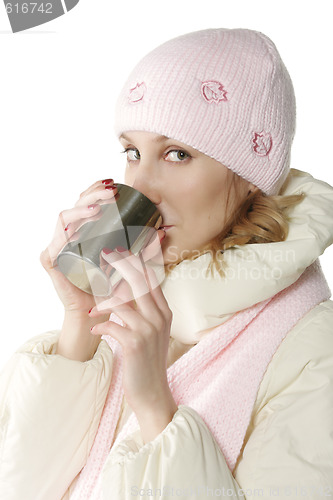 Image of Winter woman with cup sideview