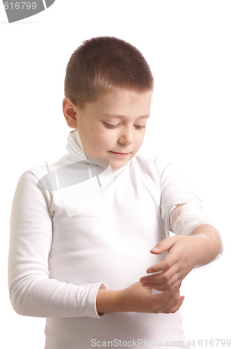 Image of Boy with bandaged arm
