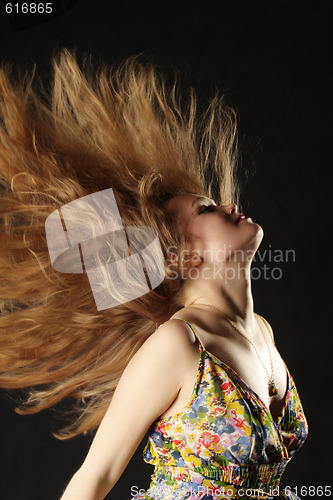 Image of Red hair in air
