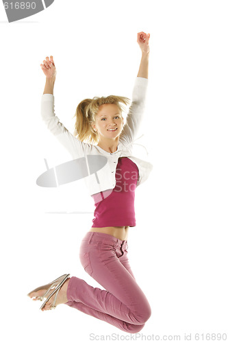 Image of Jumping girl in pink jeans