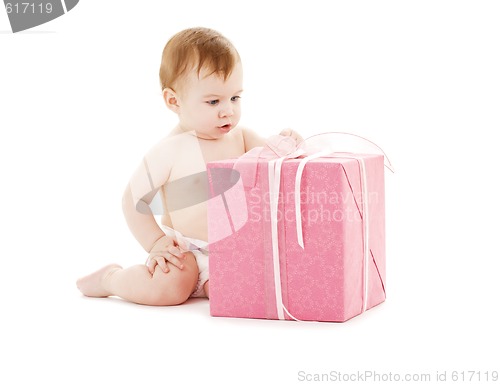 Image of baby boy with big gift box