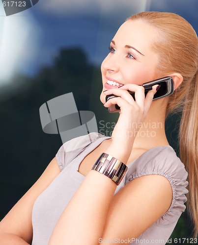 Image of lovely woman with cell phone