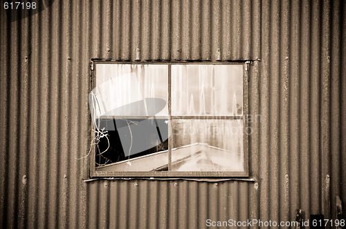 Image of old rusty metal tin shed