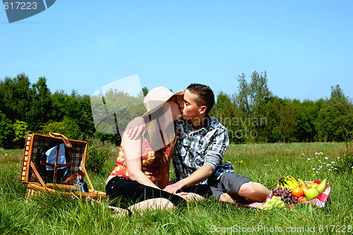 Image of Young couple at picnic
