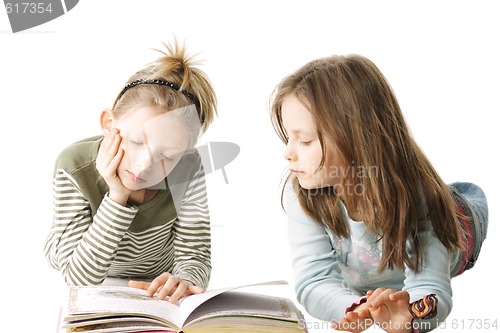 Image of Two sisters reading book