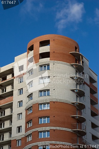 Image of Modern multistory house of red and white bricks 