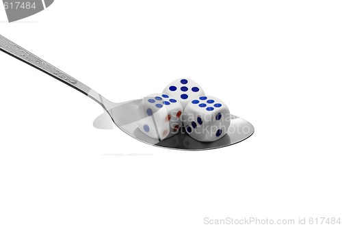 Image of Metal spoon with dices