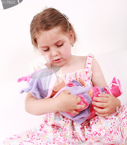 Image of Playing with doll