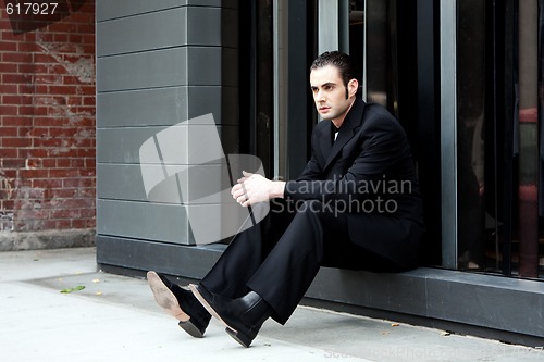 Image of Business man sitting