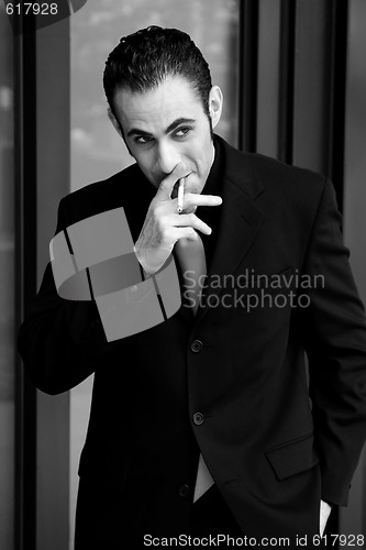 Image of Business man smoking