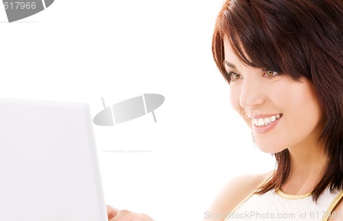 Image of happy woman with laptop computer