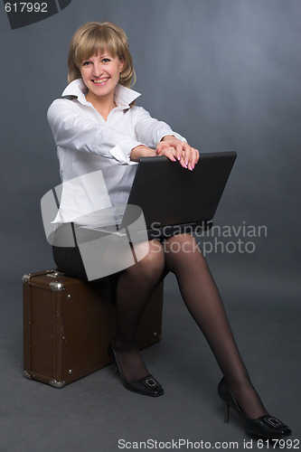 Image of business woman with laptop