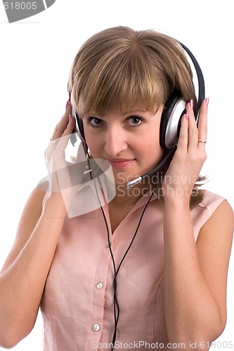 Image of Young business woman with headset
