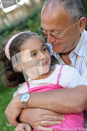 Image of Happy grandfather and kid