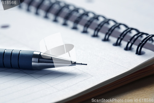 Image of Close up of a pen on a note pad