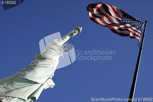 Image of statue of liberty and the american flag united states