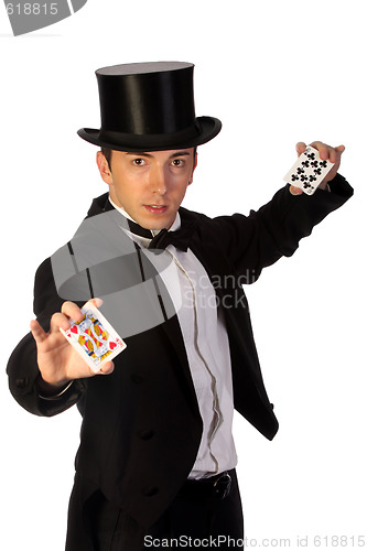 Image of young magician performing with cards