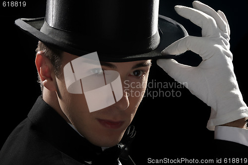 Image of young magician with high hat 