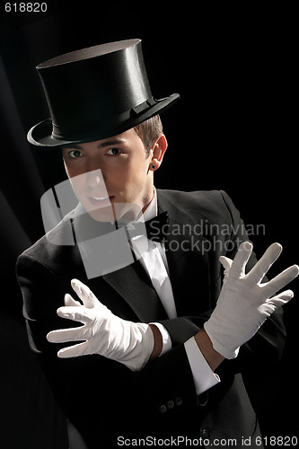 Image of young magician with high hat 