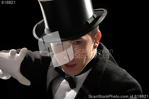 Image of young magician with high hat 